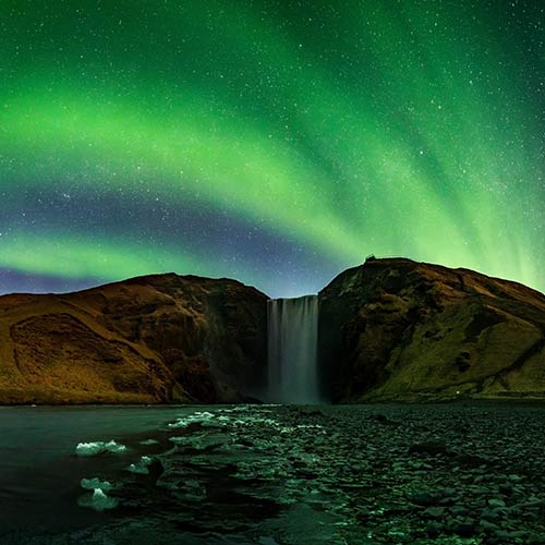 Skogafoss unter Nordlichtern © Snorri Thor